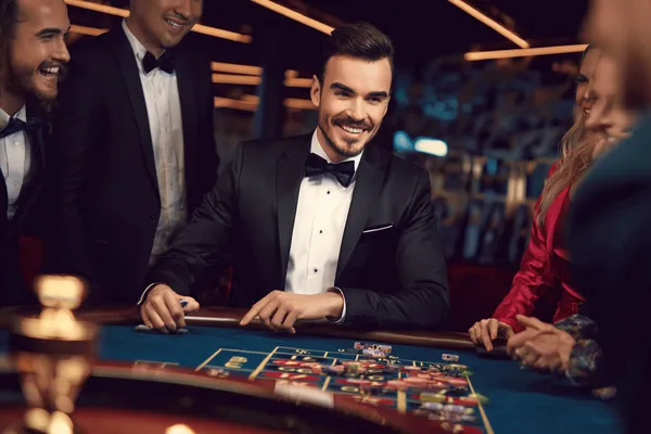 JILI7979 Jackpot Slots — Spin for massive rewards A dramatic shot of winning sevens landing on a slot reel surrounded by shining gold coins, symbolizing big wins.
